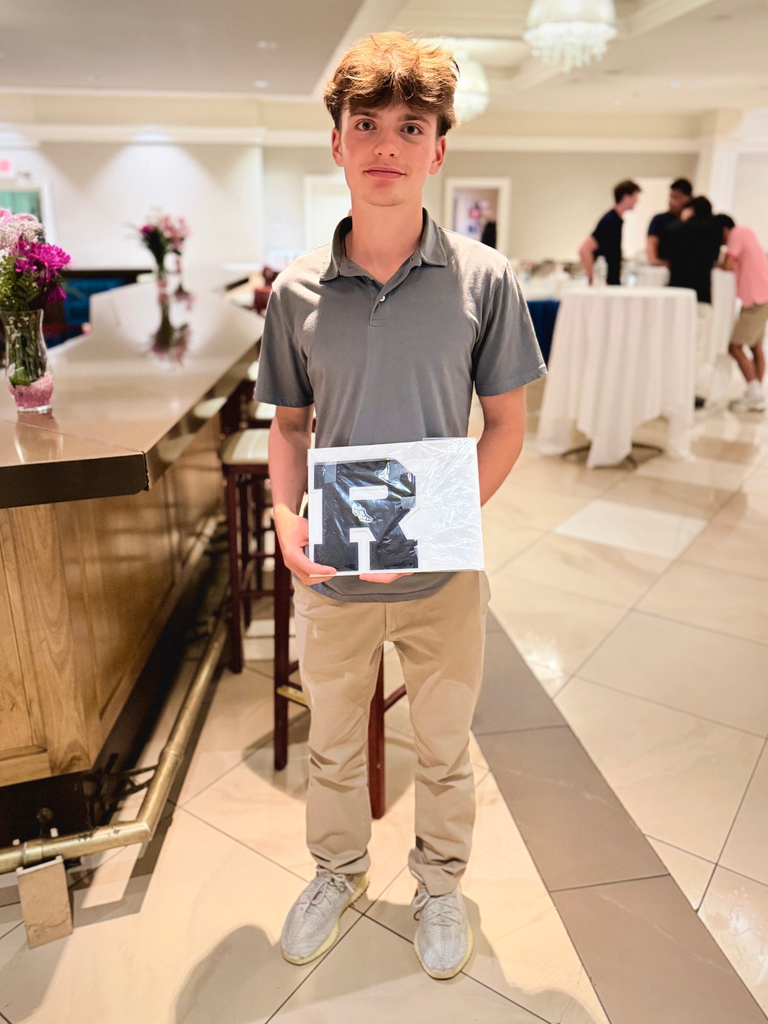 Thomas, part of the Ripple Goods family, holding a Ripple Goods box